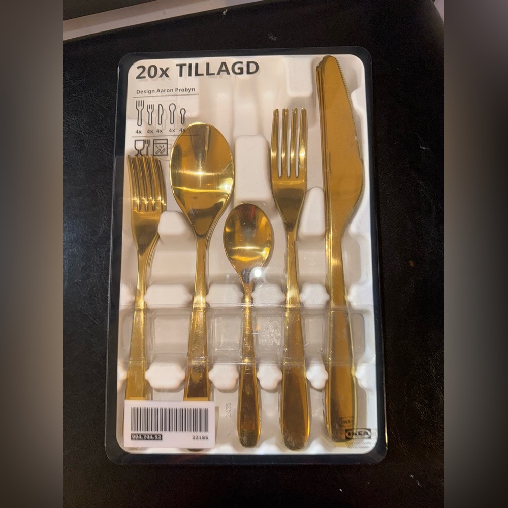 TILLAGD
20-piece flatware set, brass color